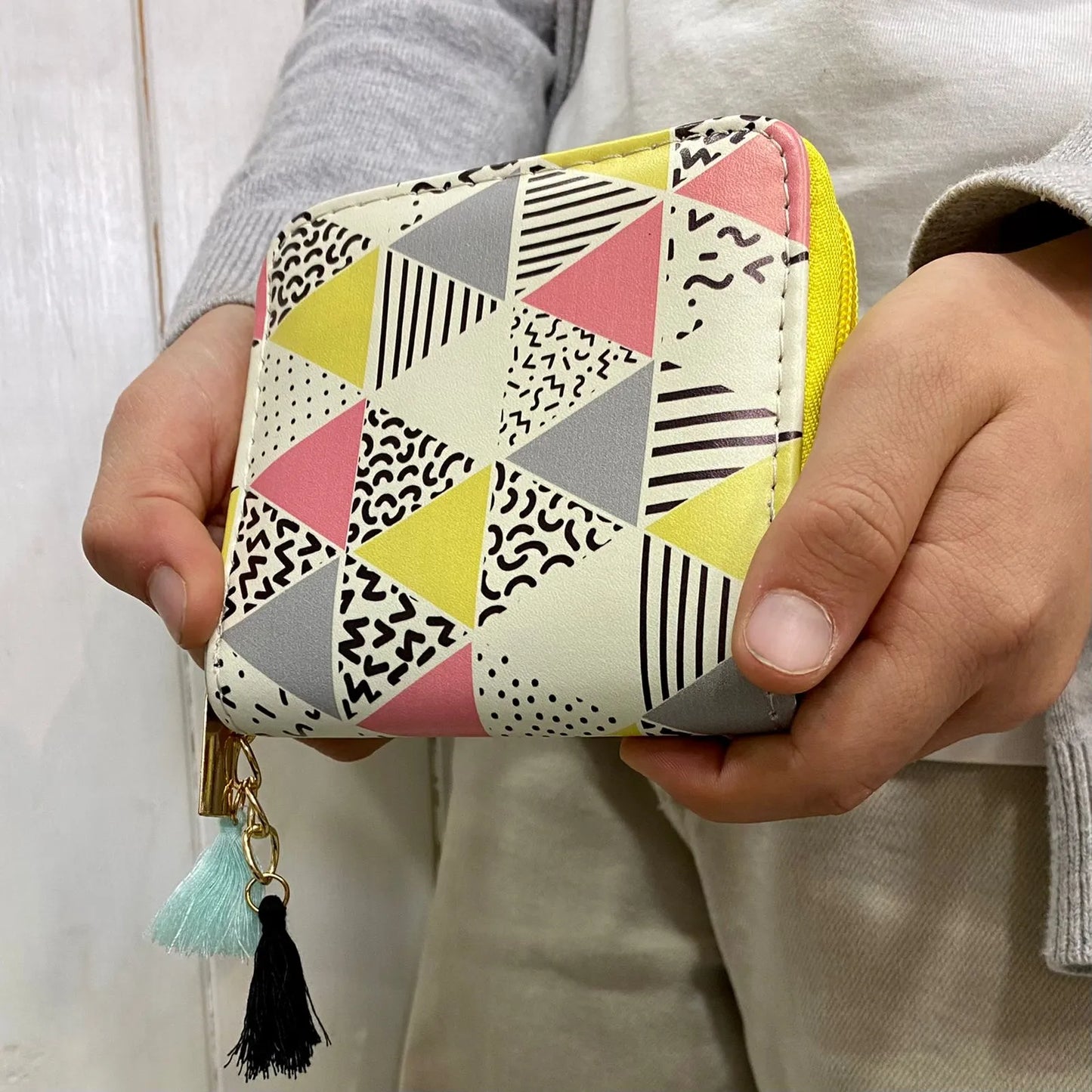 Billetera S triángulos