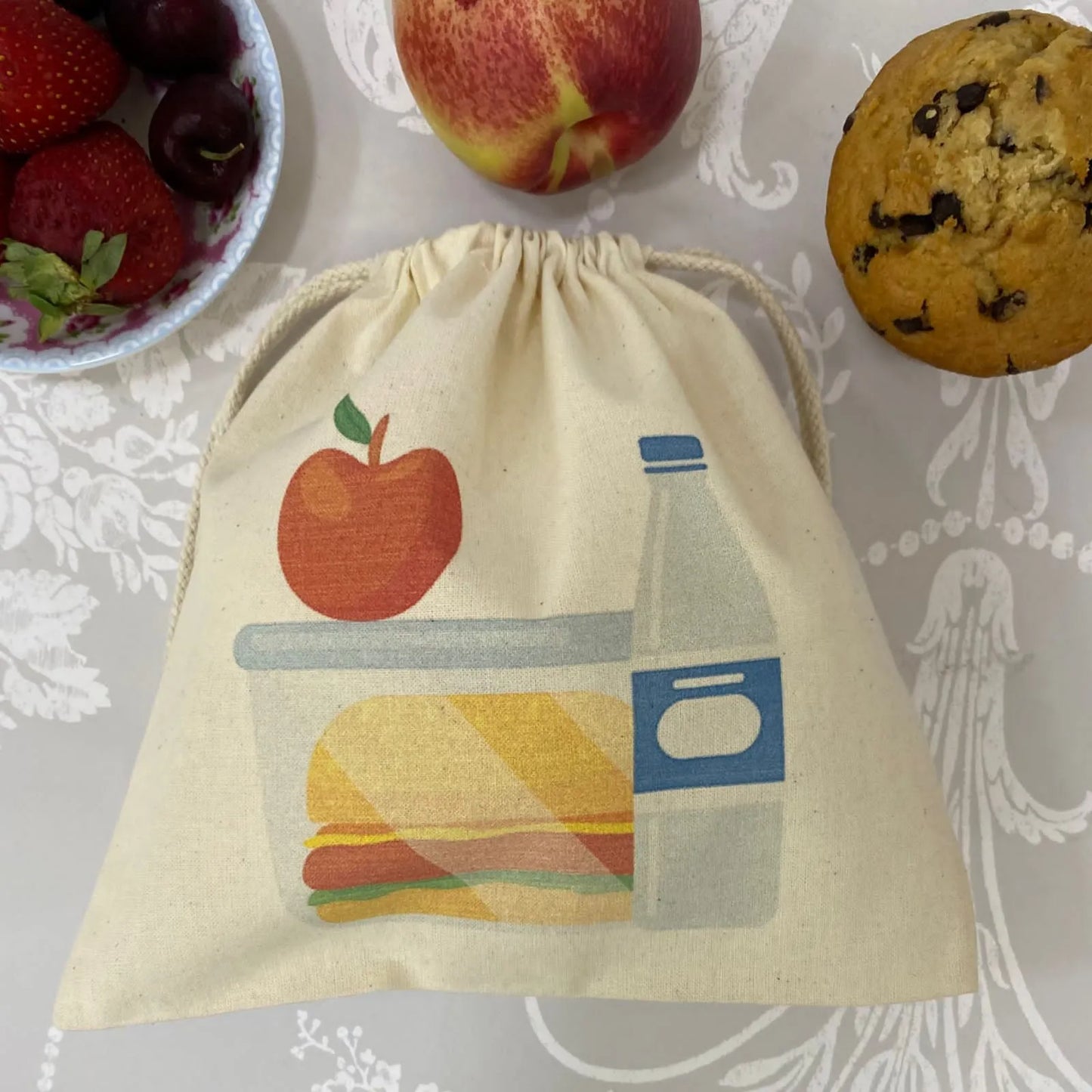 Bolsita de colación estampada manzana y agua