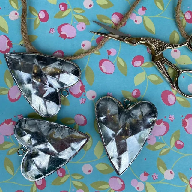 Corazón metálico S rombos