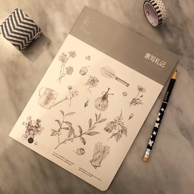 Cuaderno dibujos blanco y negro jardin