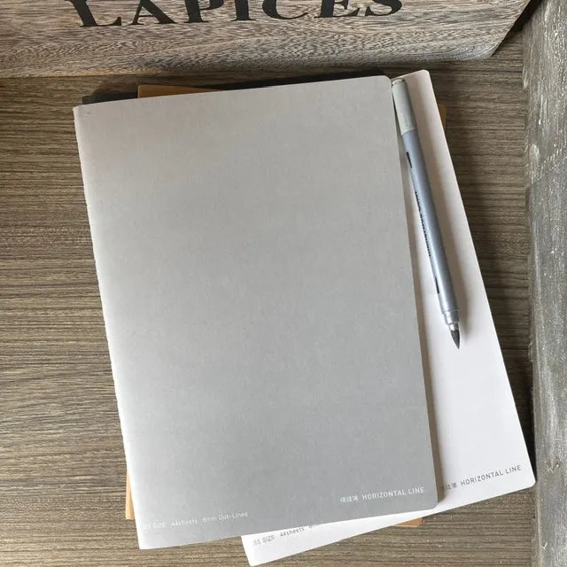 Cuaderno grande tapa blanda gris