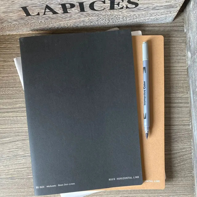 Cuaderno grande tapa blanda negro