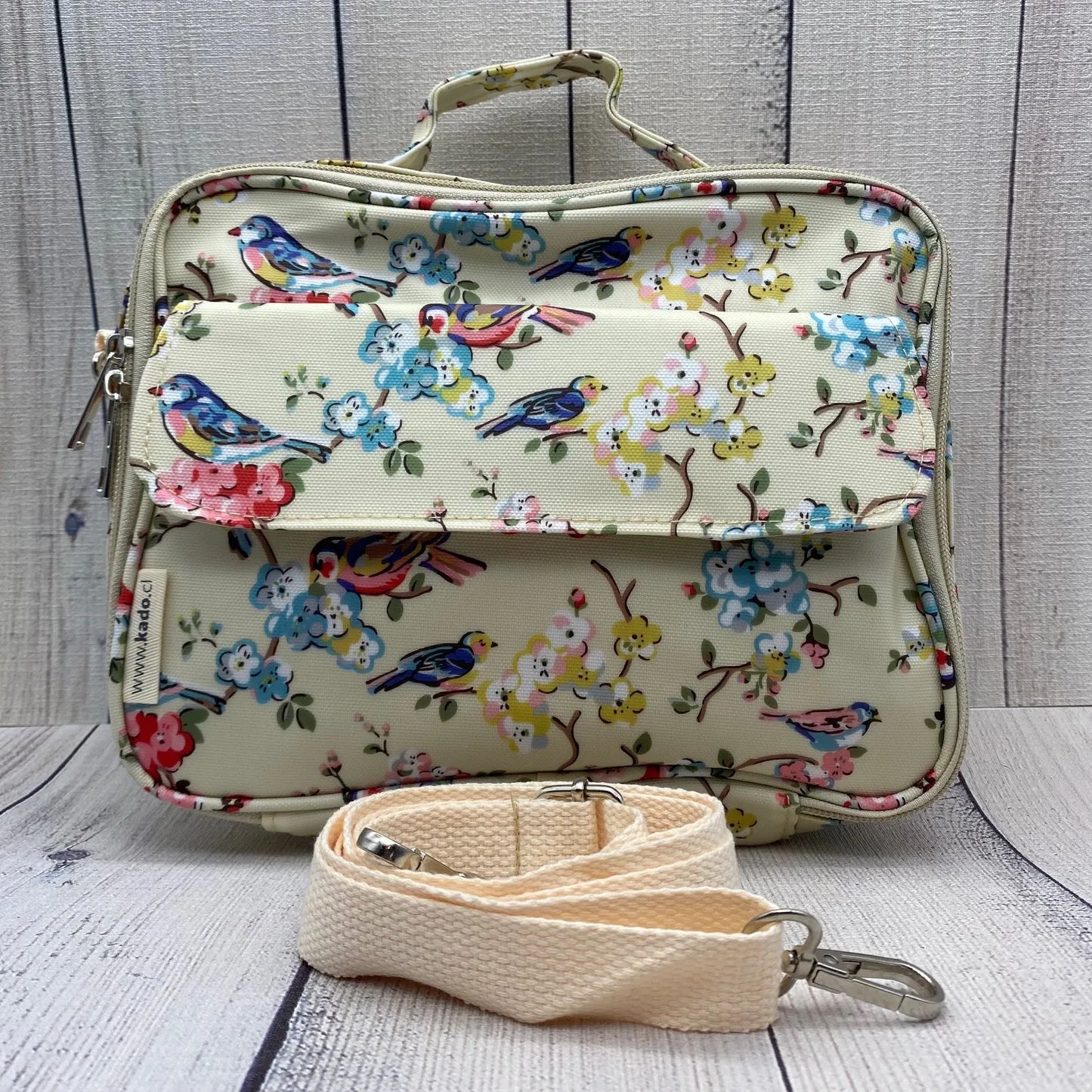 Lonchera de hule con bolsillo amarillo pajaritos