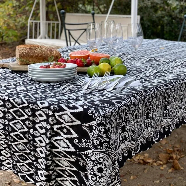 Mantel género negro rombos