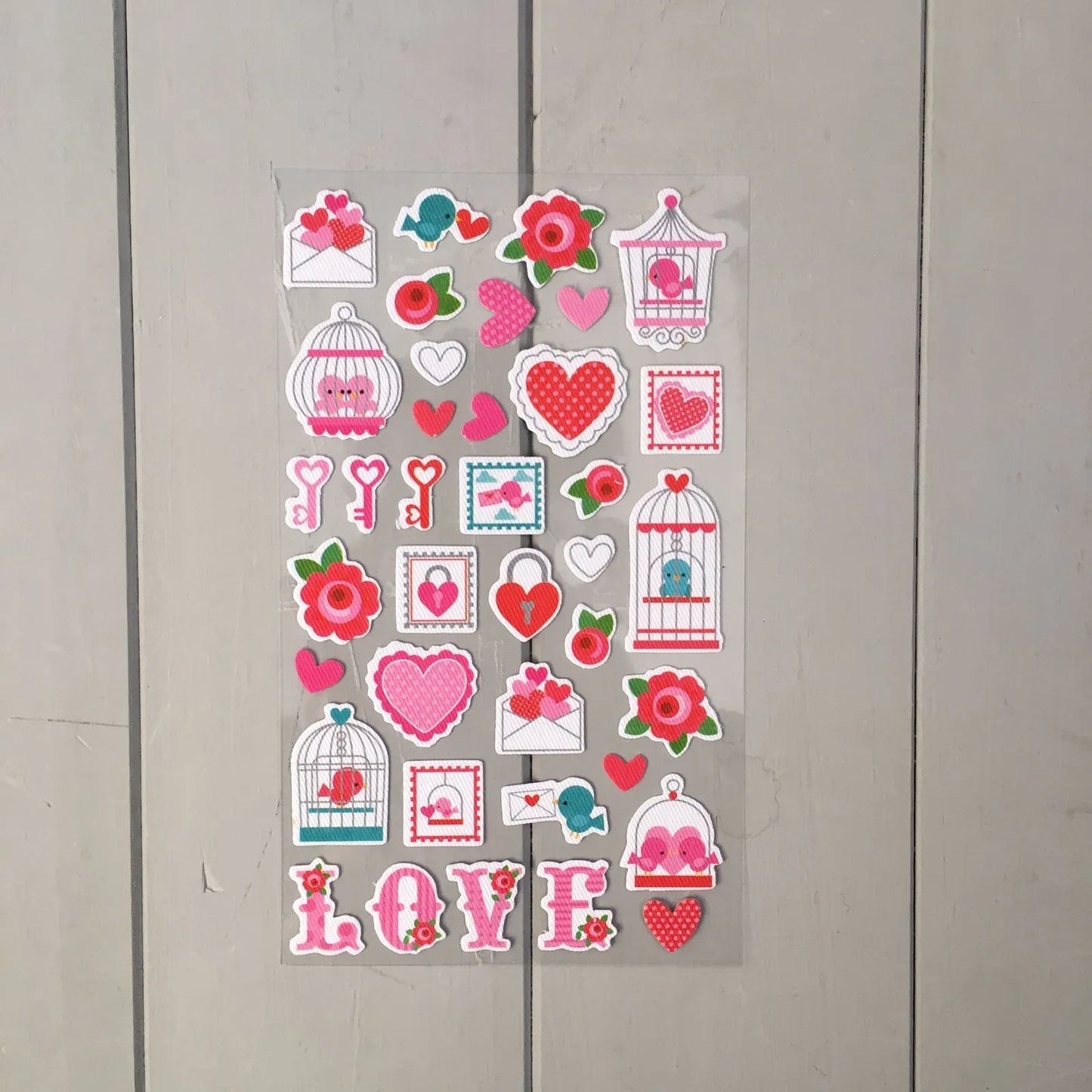 Sticker género corazones