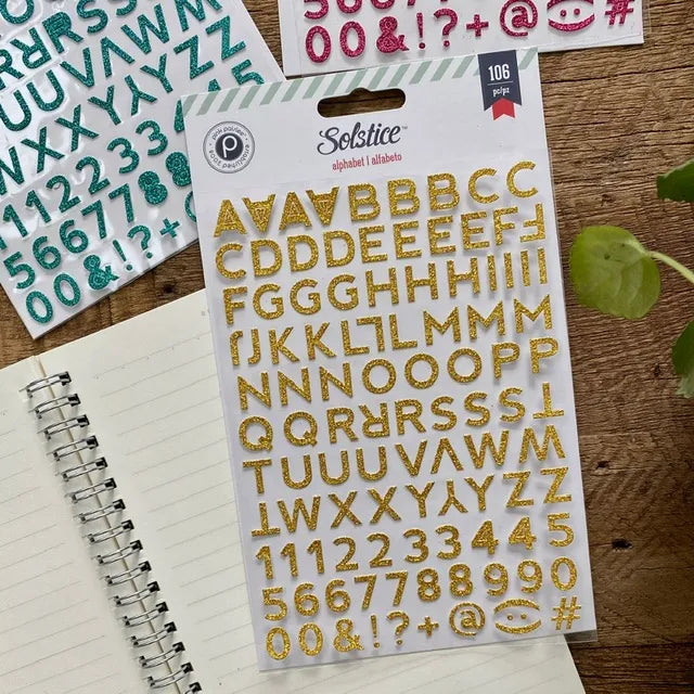 Stickers letras brillantinas doradas
