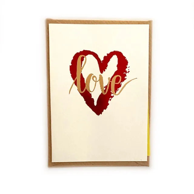Tarjeta blanca y dorada corazón love