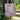 Bolso largo de hule beige puntos y flores