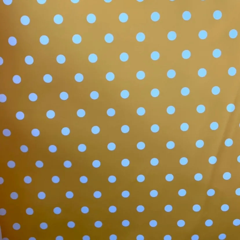 Hule amarillo lunares