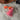 Llavero tres pompones bicolor rosado y  naranjo