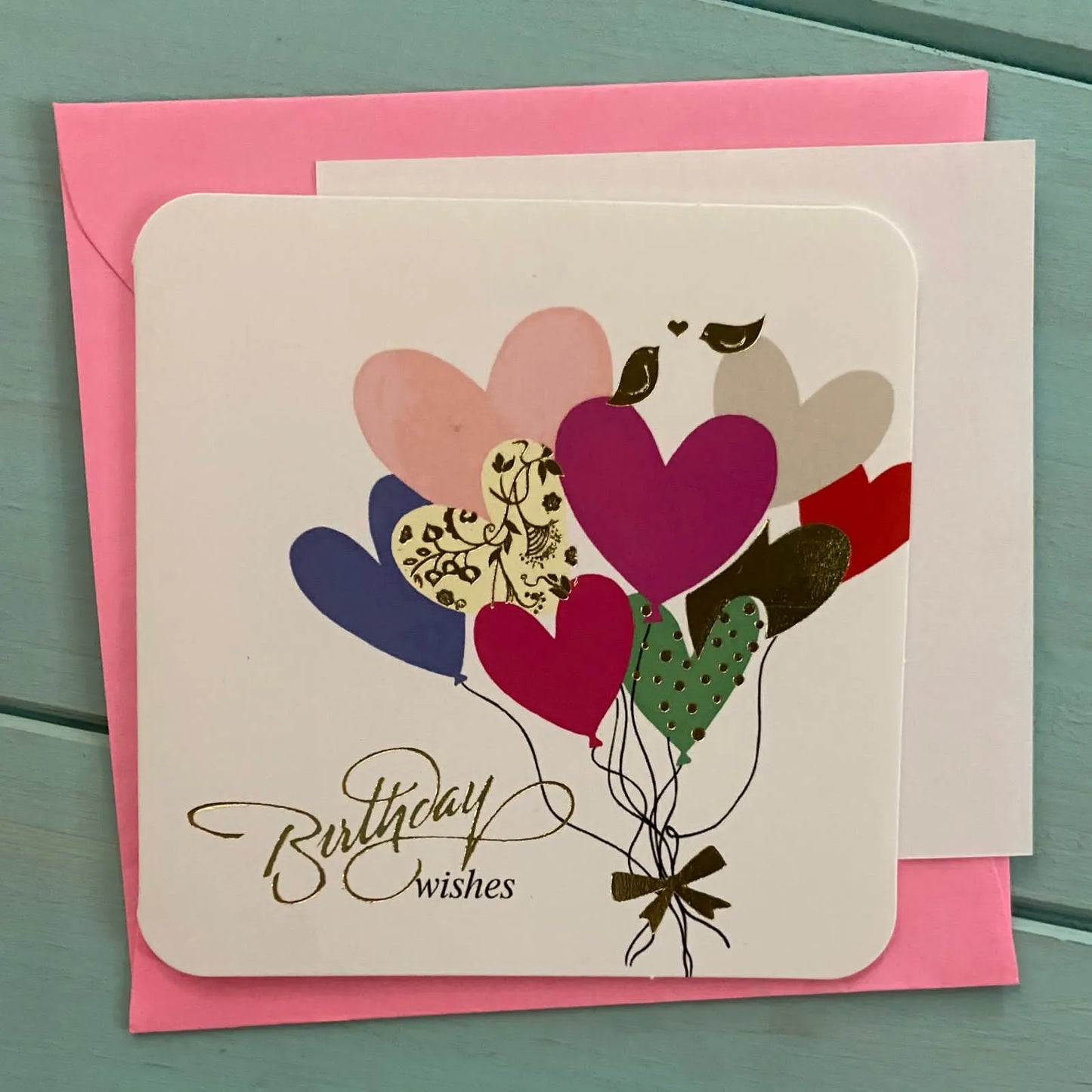 Mini tarjeta sobre color corazones