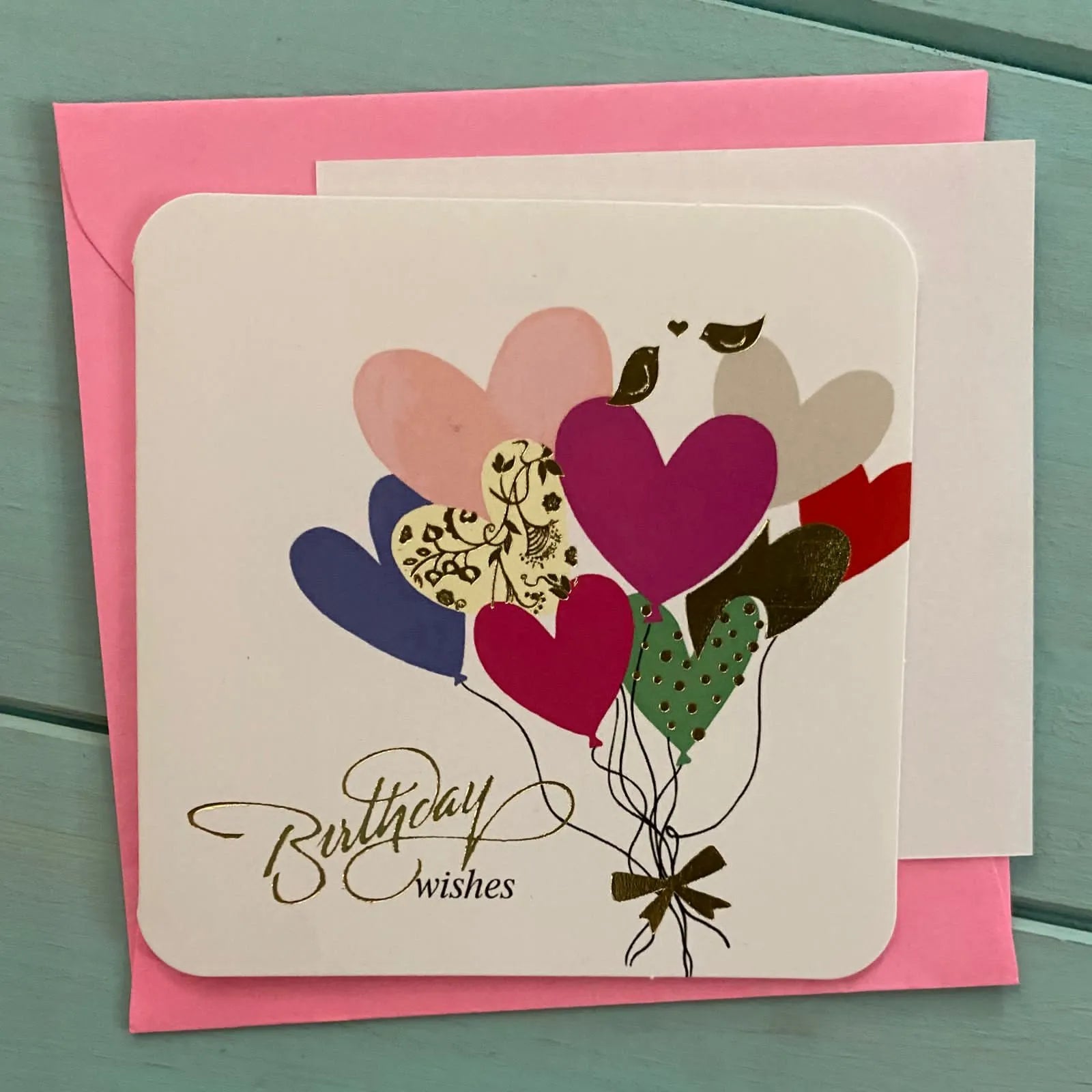 Mini tarjeta sobre color corazones